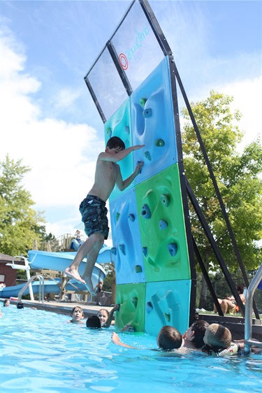 The pool climbing wall.