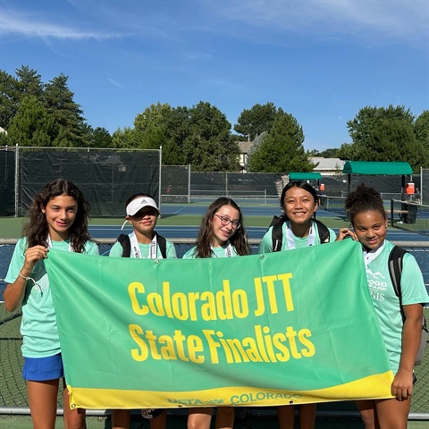 five girls in green shirts holding a sign that says Colorado JTT State Finalists