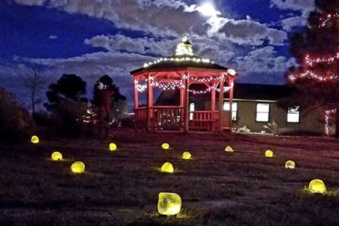 Ice lamps and a lit-up gazebo at the park.