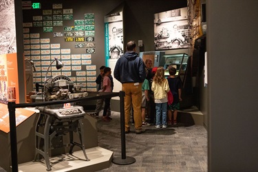 children and parents viewing a permanent exhibition