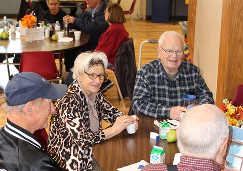 Lunch goers talk during a VOA lunch.