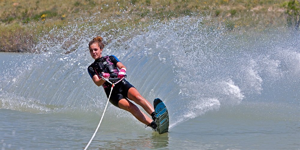 A person waterskis.