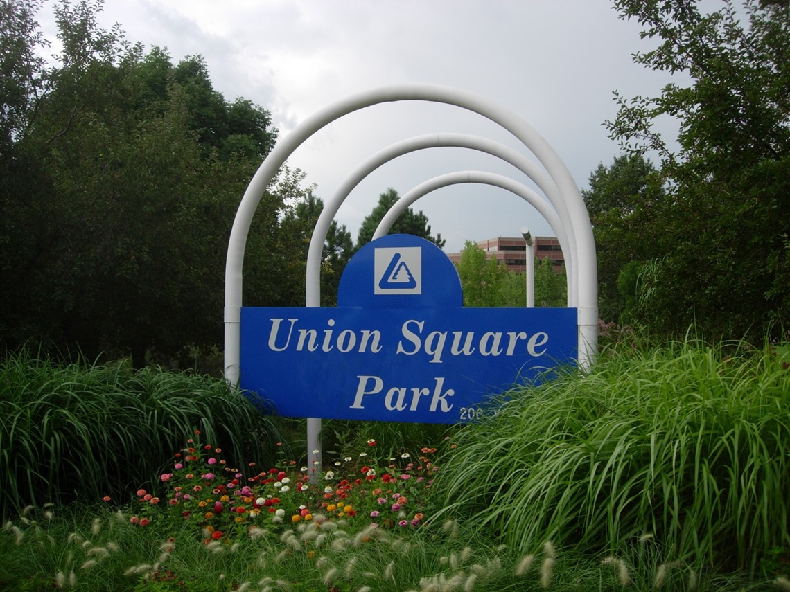 Union Square Park sign and flowers