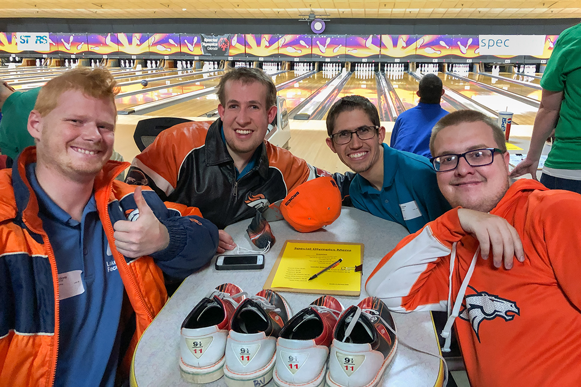 A group of Saturday bowling participants pose at the bowling alley.