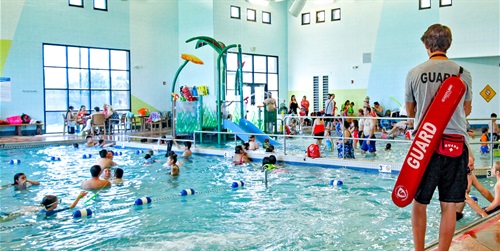 People swim in the Link pool