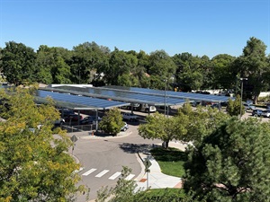 Aerial view of parking cover with cars parked underneath