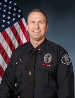 Headshot of Mark Schmachtenserger