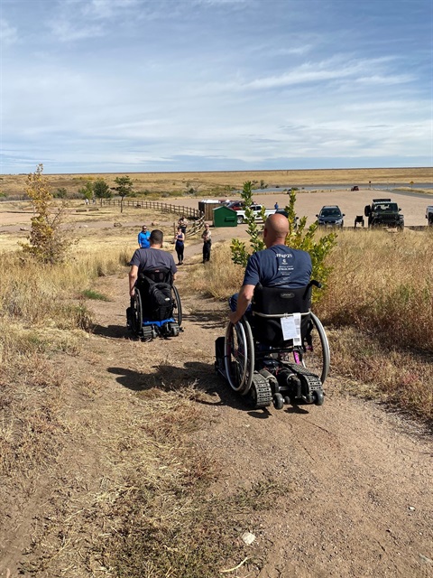 People using Freedom Trax motorized offroad attachments